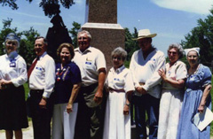 Descendants stand in front of SFA monument