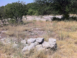 Period-cut stones near the quarry still waiting to be put to use.