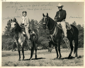 Tom Hogg and his wife, Margaret, with two of their equine friends.