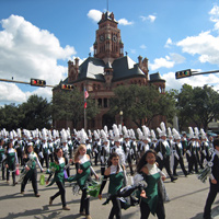 Band parades in front of the courthouse.