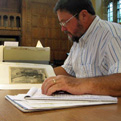 Moore researching at Yale's Beinecke Library.