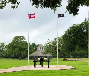 The Old Val Verde Cannon, period flags, and the historic pavilion.