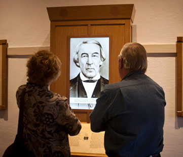 Visitors view an exhibit.