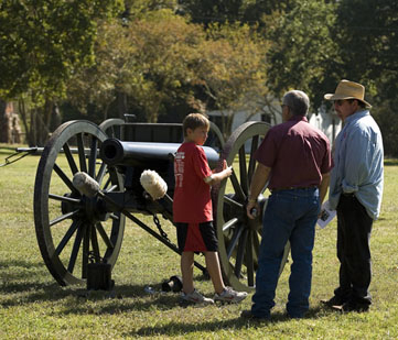 Visitors learn about cannons.