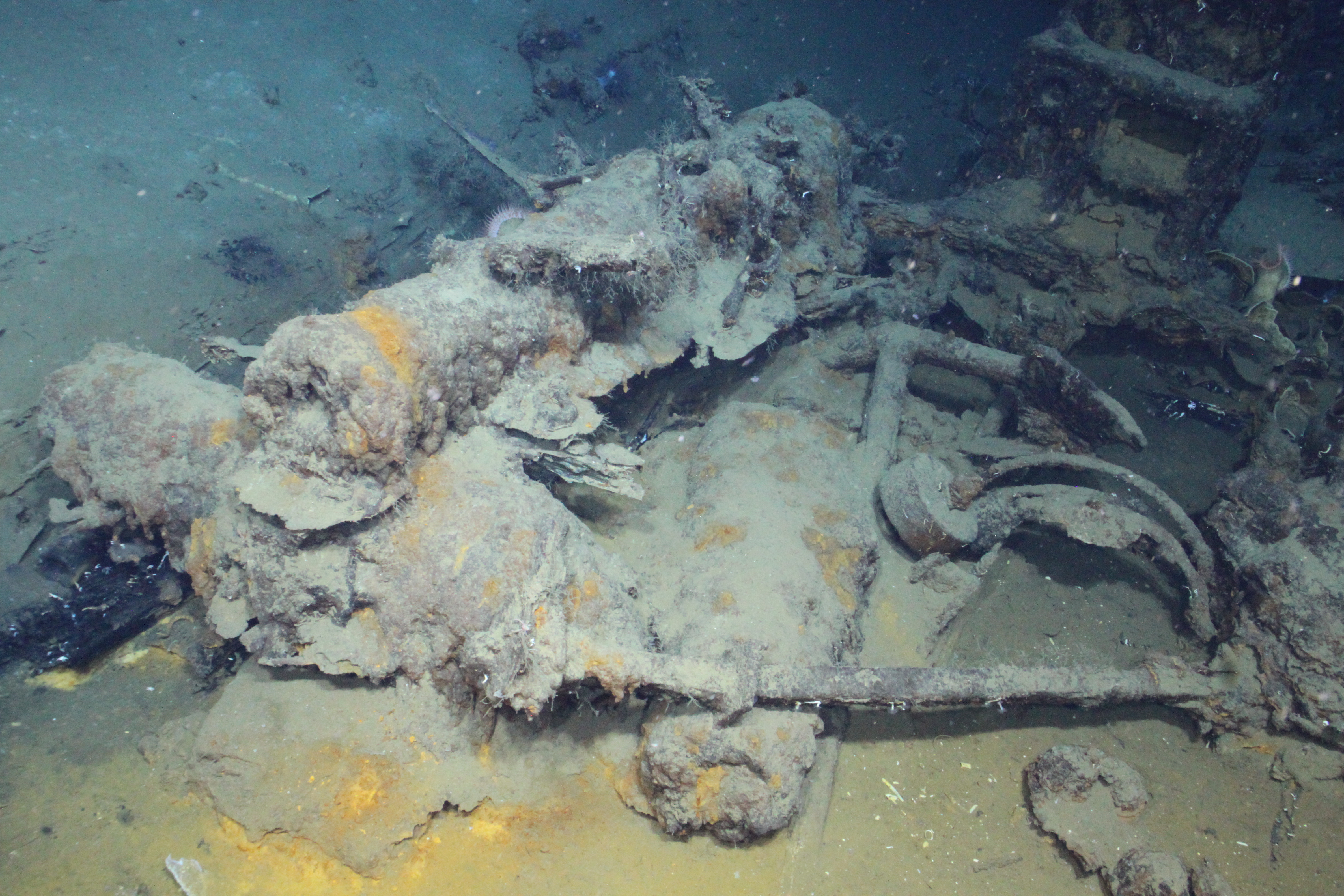 Marine archeology site; underwater, ship materials covered with silt