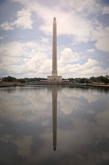 Picture of a monument being reflected in a pool of water