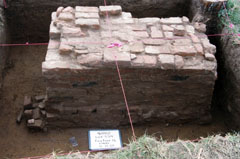 Archeological excavation of fireplace footing