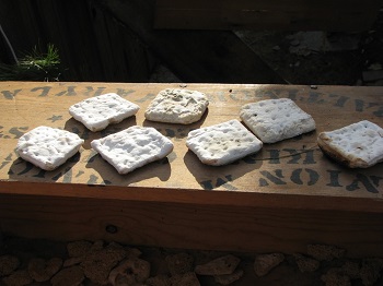 Picture of some hardtack on a table 