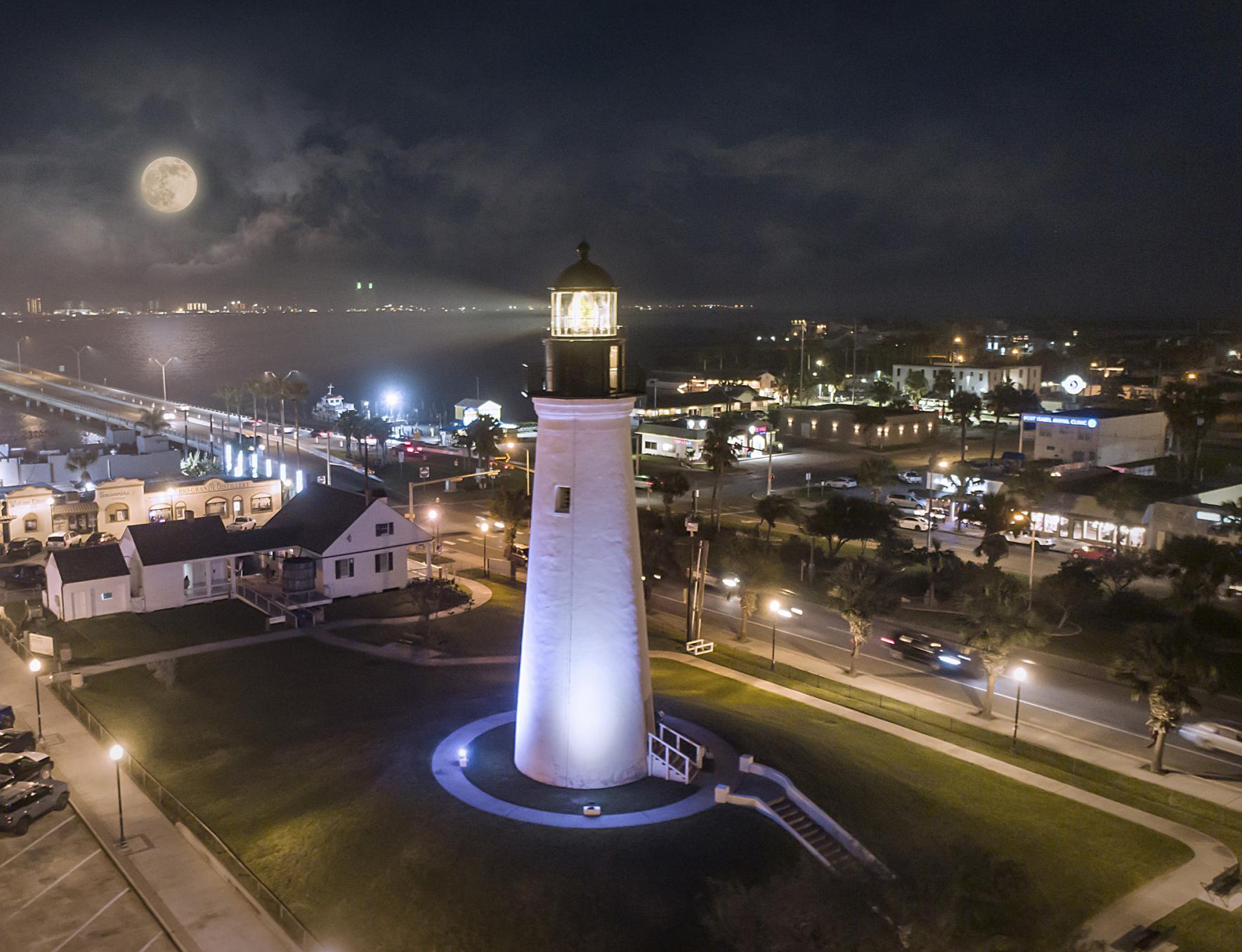 Aerial photo of the Port Isabel Lighthouse at night